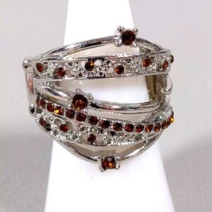 Silver Tone Brown Crystal Open Work Wide Ring. Stretch Ring can fit Size 6-7.5.